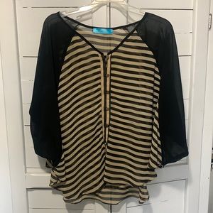 Black and beige striped blouse with button details.